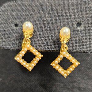 Gold tone clip on earrings with faux pearl accented dangling square